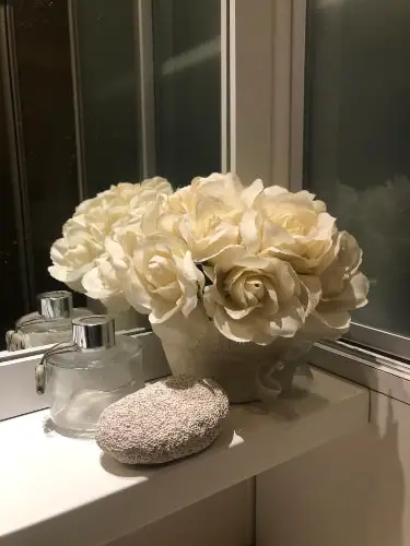 bathroom decor with artificial flower